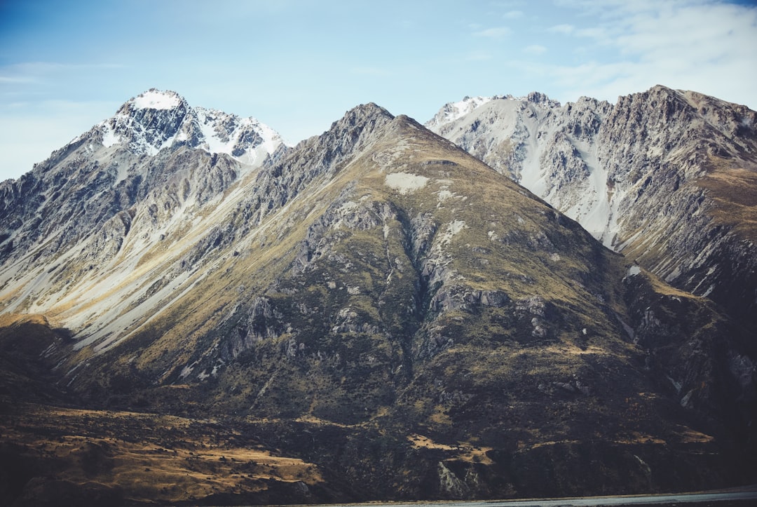 On the road to the home of giants, Mt Aoraki National Park. by History Hidden snow capped mountans