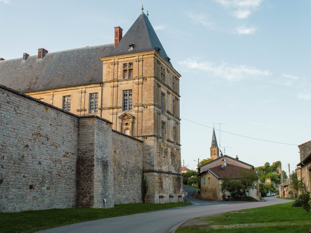 Rennes-le-Château hidden treasure by History Hidden a large building with a clock tower on top of it